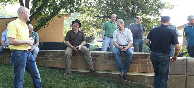 Camaraderie amongst the Silent Rivers team during a company gathering at a client's home