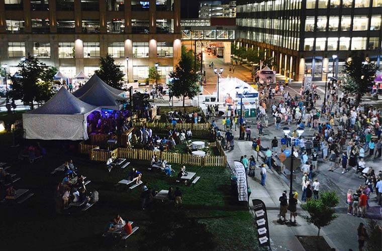 Des Moines Arts Festival nighttime aerial view showing the Silent Rivers VIP Club. Photo by The Wilde Project.