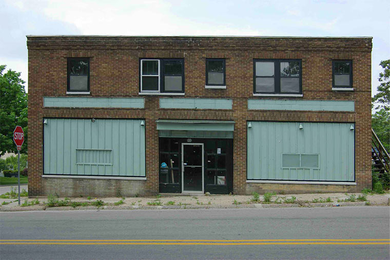 Green & Main building in Sherman Hill, Des Moines, Iowa prior to the preservation and renovation by Silent Rivers