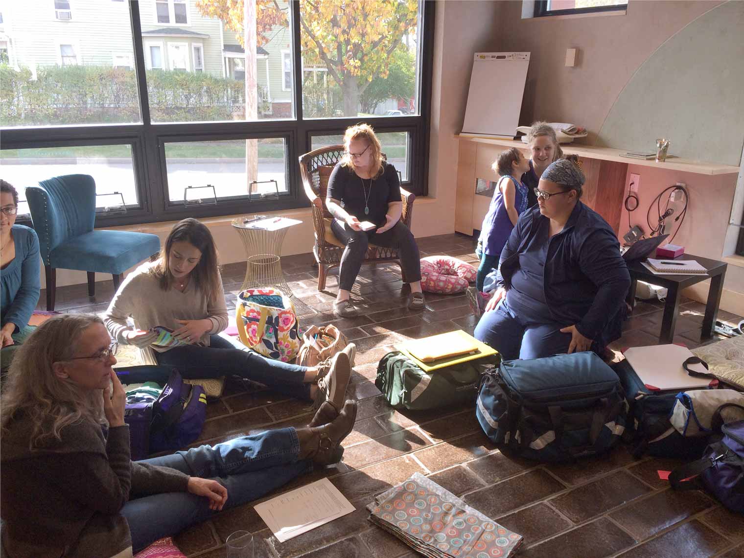 Healing Passages midwives and staff meeting in the Sacred Commons.