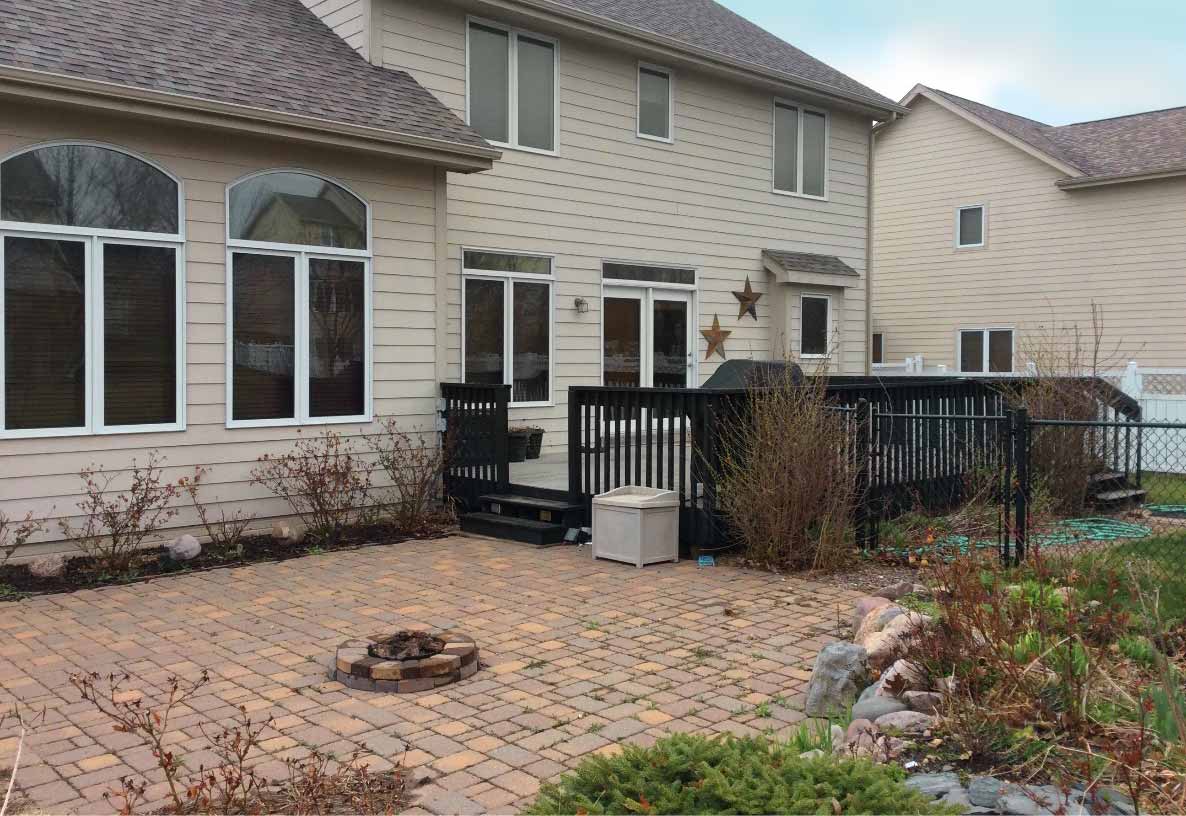 Before photo of outdoor patio space needing a new design by Silent Rivers, Des Moines