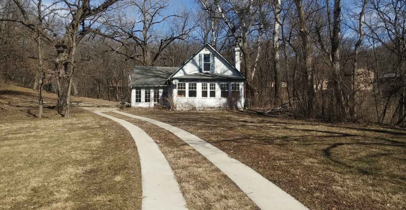 1901 house sitting on a side lot in a Des Moines neighborhood will be razed to build a new custom home by Silent Rivers