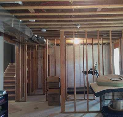 before basement remodel by Silent Rivers in an Urbandale, Iowa home included some existing rough framing