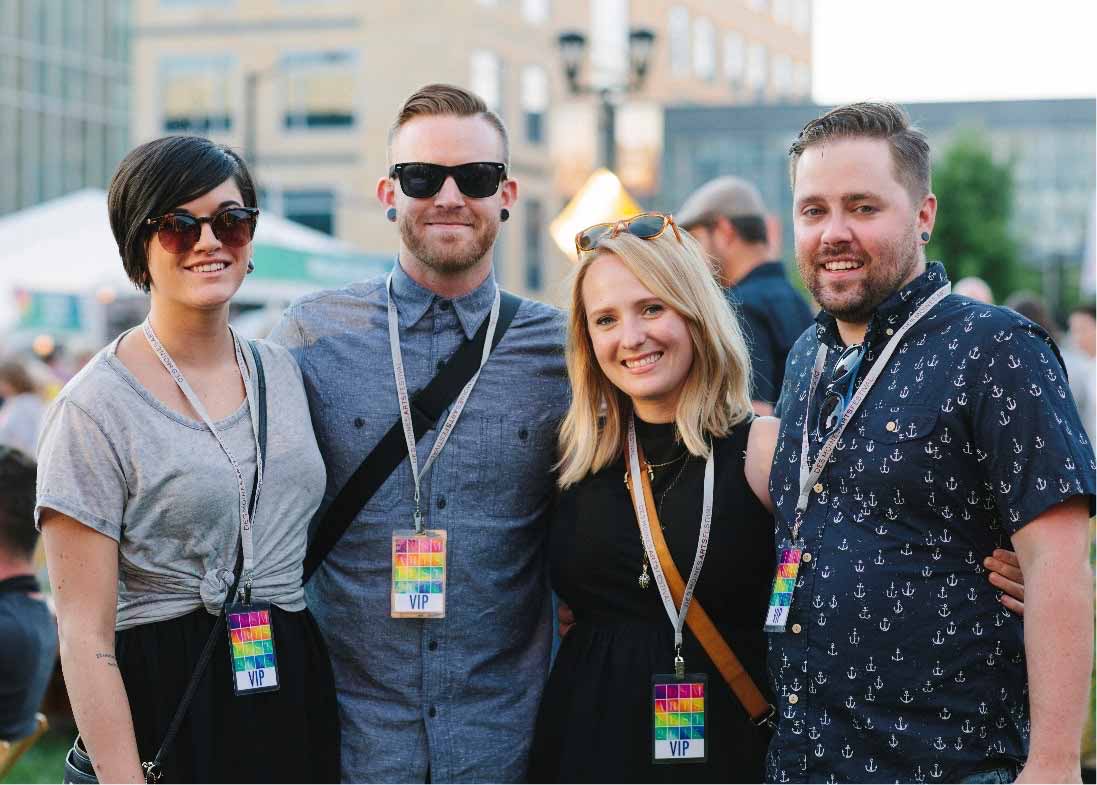 four young professionals VIP Patrons at Des Moines Arts Festival Silent Rivers VIP Club 2016