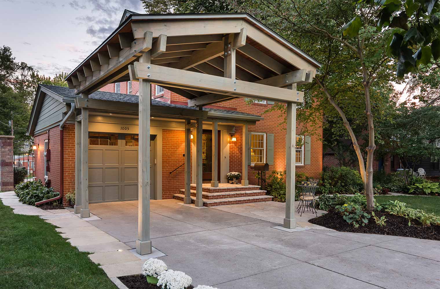 carport addition to garage on 1935 Federal style Des Moines home by Silent Rivers