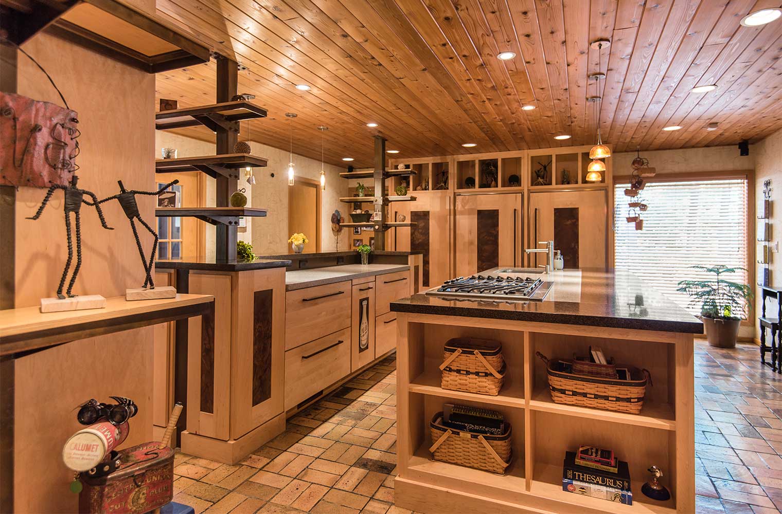two island kitchen with light and dark quartz counters in a maple and steel cabinet kitchen in Johnston by Silent Rivers