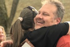 Chaden Halfhill receives a congratulator hug from designer Teodora Shtinareva after he was awarded the 2017 David G. Hurd Innovator in the Arts award.