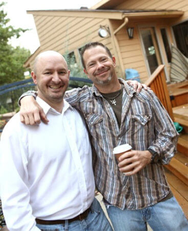 Designer Tyson Leyendecker and lead artisan John Miller at a Silent Rivers gathering at a client's home