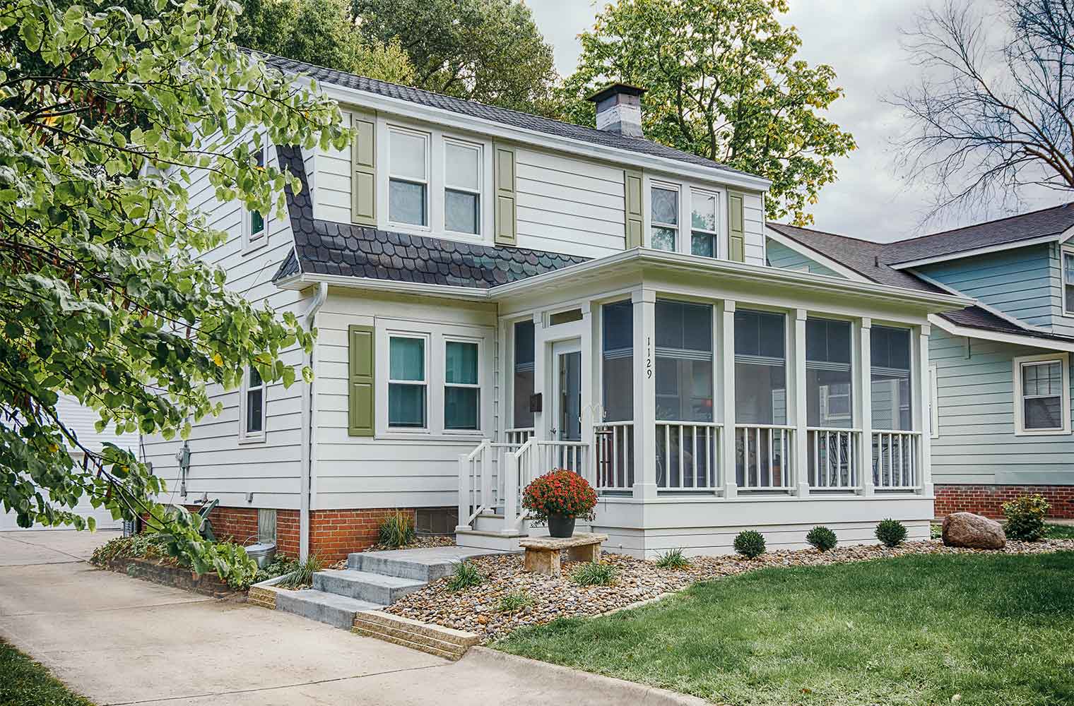 enclosed front porch addition on Des Moines home by Silent Rivers