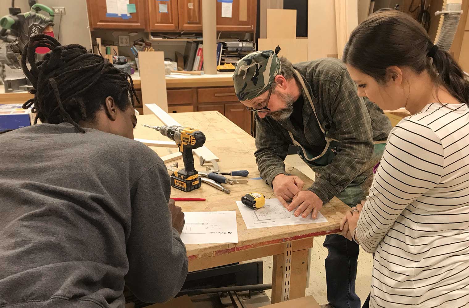 Silent Rivers Woodshop manager Tom Bloxham discusses custom cabinetry project for a Des Moines home remodeling with designers David Houston and Amie Schurman