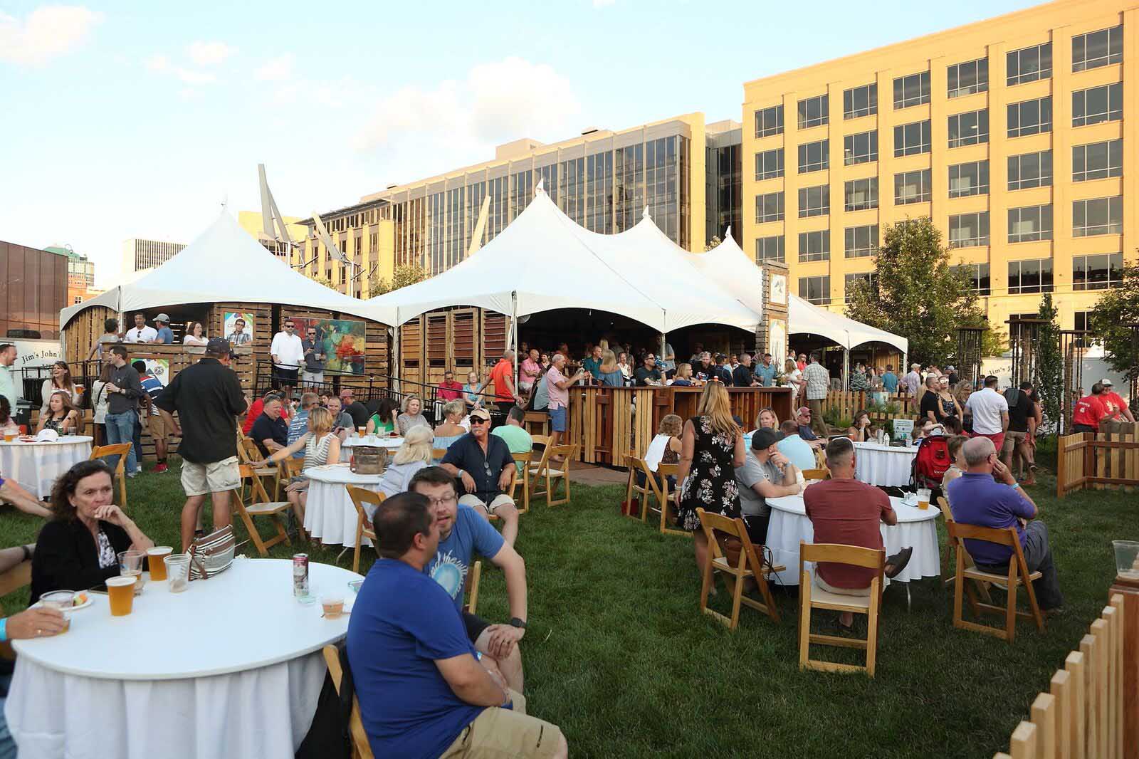 People enjoying Silent Rivers VIP Club at 2018 Des Moines Arts Festival