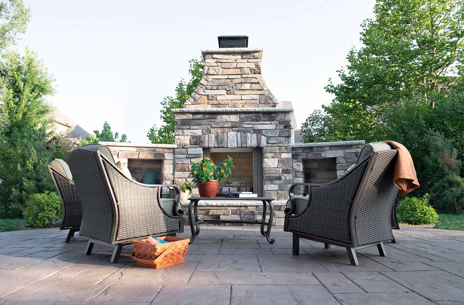 Urbandale Iowa stone fireplace and stamped concrete patio by Silent Rivers