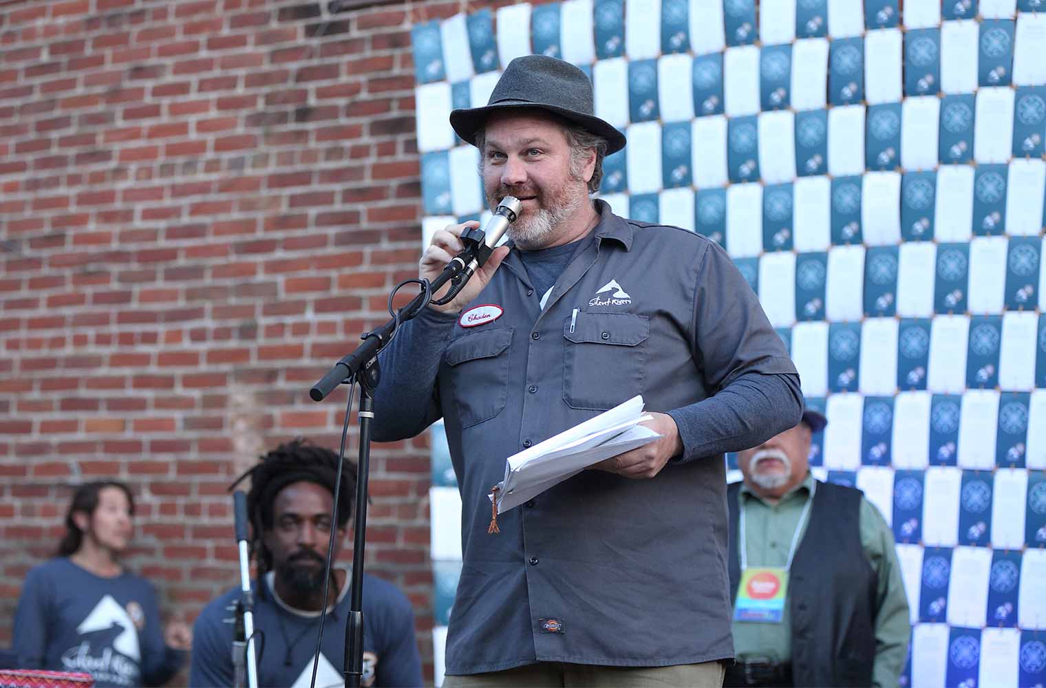 Chaden Halfhill speaking at Silent Rivers 25th Anniversary and dsm Unveiling